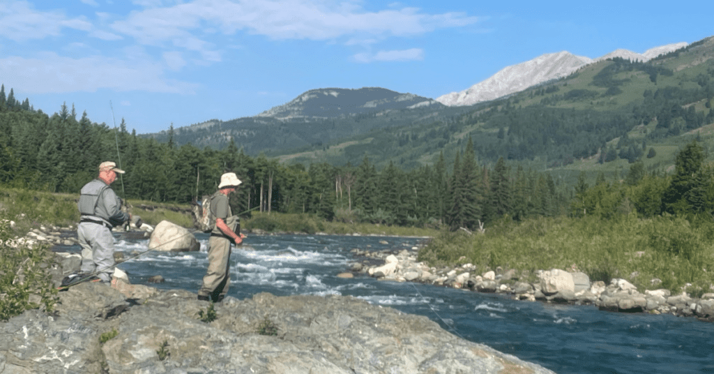 Highwood River Fishing 24 with Guide and Brother-in-law: Clear high water, lush greenery, and majestic Rocky Mountains